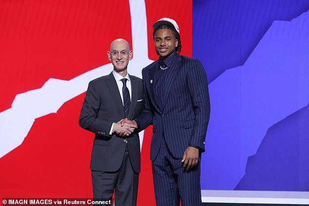 He mustered a smile when he joined NBA Commissioner Adam Silver on the stage in Brooklyn