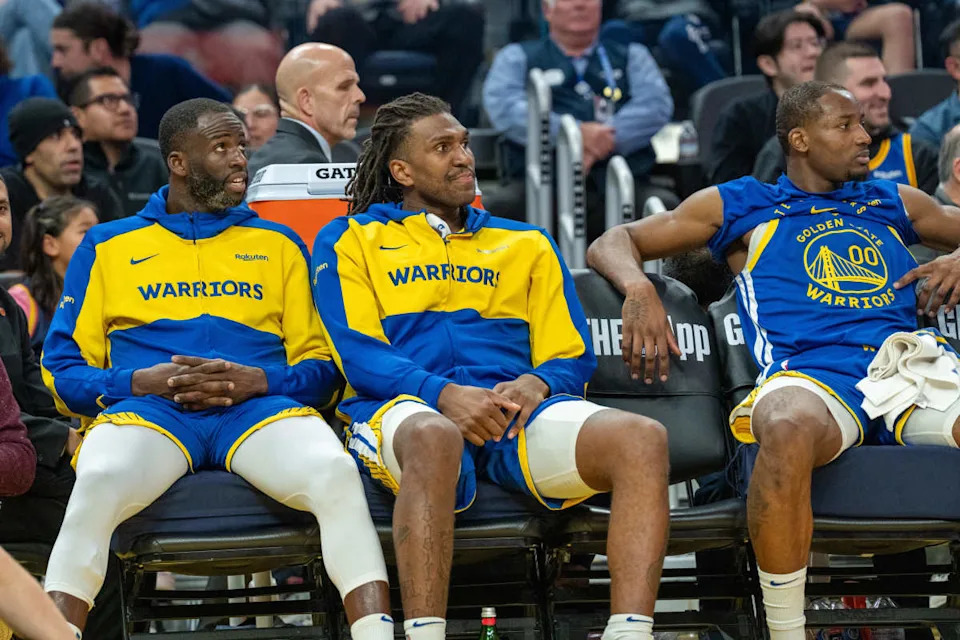 Golden State Warriors forwards Draymond Green and Kevon LooneyNeville E&period; Guard-Imagn Images
