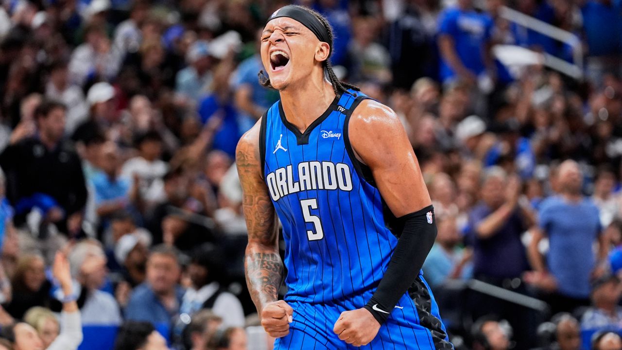 FILE - Orlando Magic forward Paolo Banchero celebrates a 3-point shot against the Boston Celtics during the first half in game 3 of a first-round NBA playoff basketball series, April 25, 2025, in Orlando, Fla. (AP Photo/John Raoux, File)