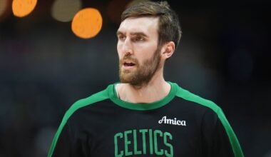 Boston Celtics center Luke Kornet looks on in the first half of an NBA basketball game, Jan. 7, 2025, in Denver. (AP Photo/David Zalubowski)