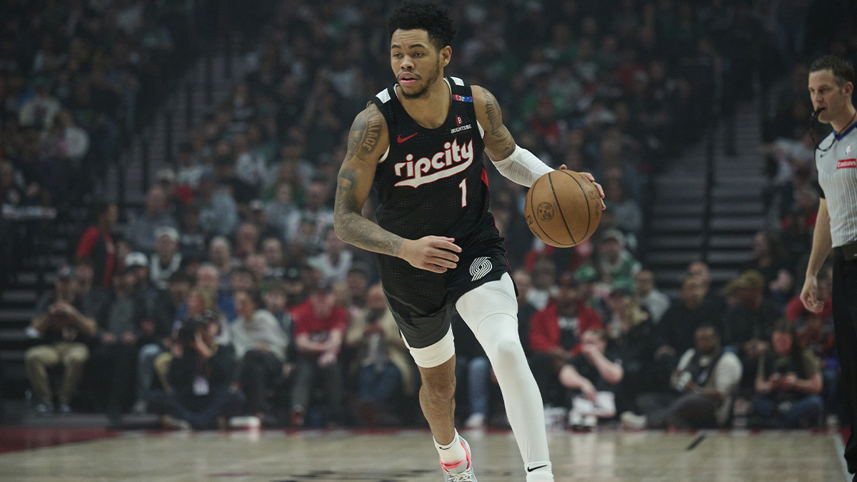 Portland Trail Blazers guard Anfernee Simons (1) dribbles the ball during the first half against the Boston Celtics at Moda Center.