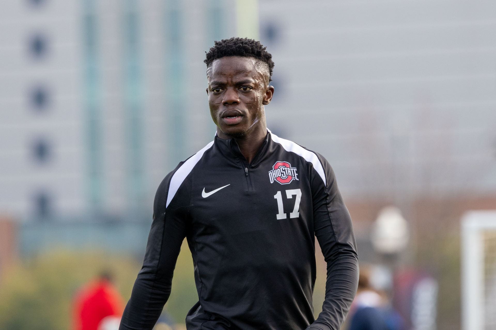 Ohio State senior midfielder Michael Adedokun (17) warms up before the Big Ten tournament match against Michigan Sunday. The Buckeyes defeated the Wolverines 1-0. Credit: Sandra Fu | Photo Editor