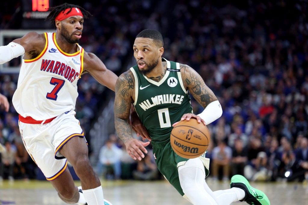 Damian Lillard returns to Portland Trail Blazers on three-year deal