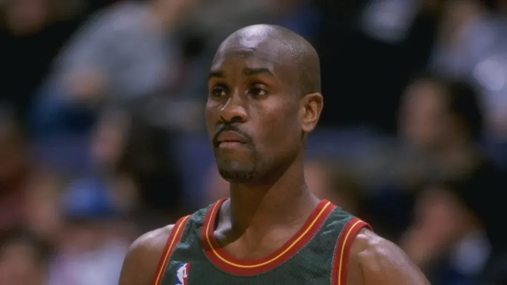 Guard Gary Payton of the Seattle Supersonics stands on the court during a game against the Seattle Supersonics
