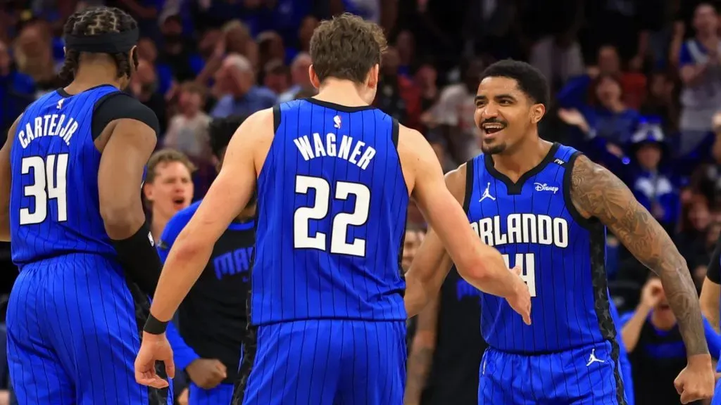 Franz Wagner #22 and Gary Harris #14 of the Orlando Magic reacts to a play during the second half of an NBA play-in tournament game against the Atlanta Hawks at Kia Center on April 15, 2025 in Orlando, Florida.