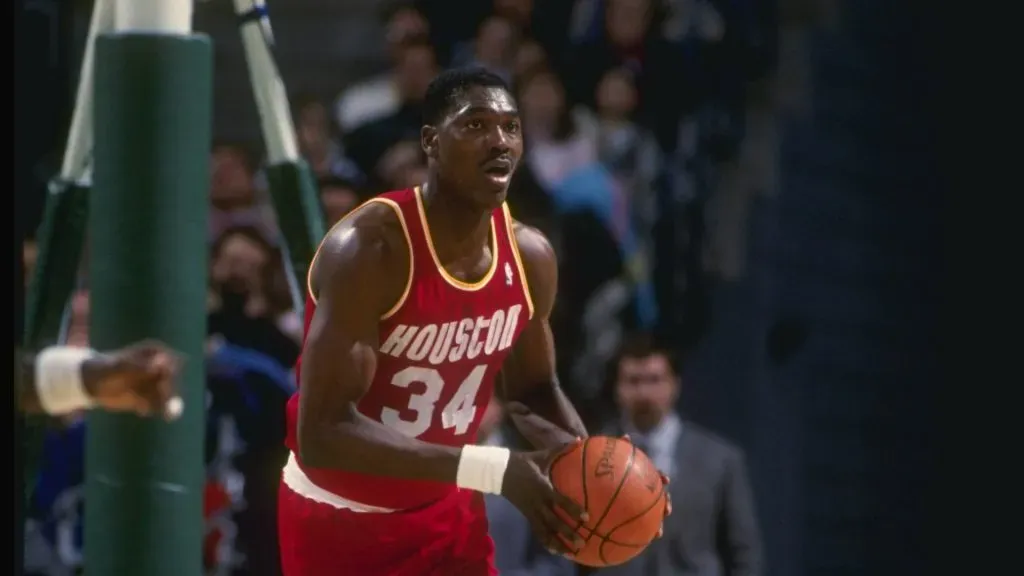 Hakeem Olajuwon of the Houston Rockets in action with the ball.