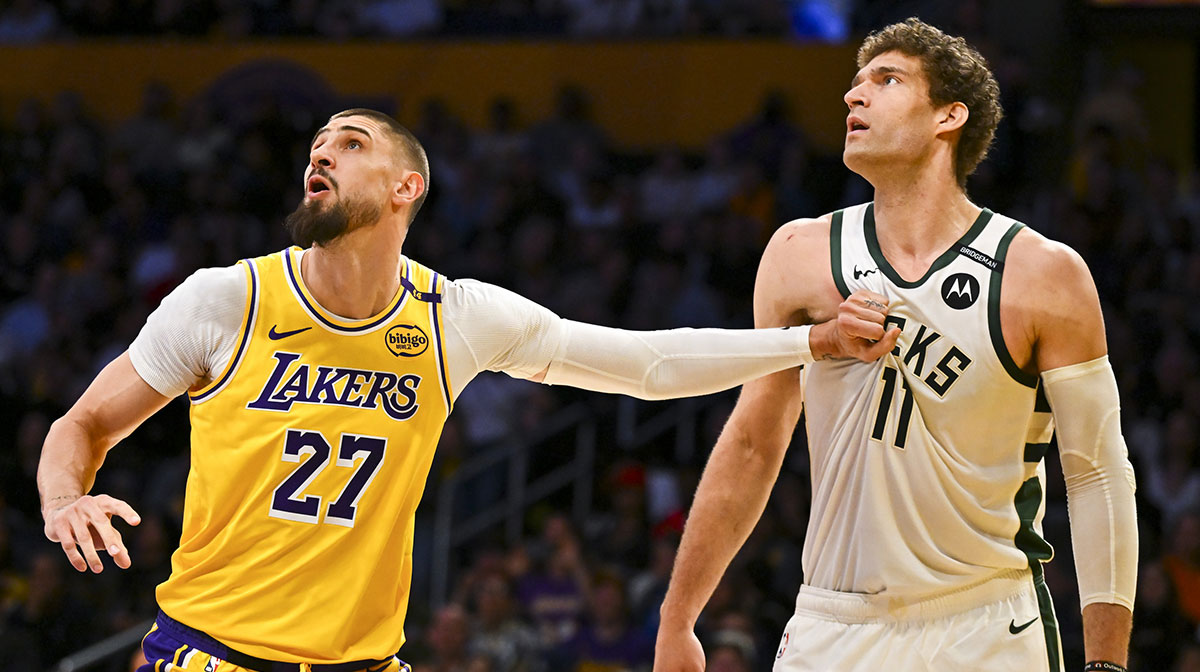 Los Angeles Lakers center Alex Len (27) defends against Milwaukee Bucks center Brook Lopez (11) during the first half at Crypto.com Arena.