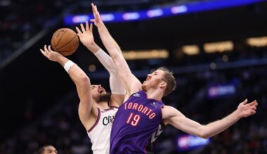 Jakob Poeltl #19 of the Toronto Raptors...