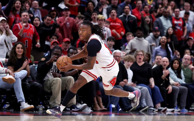 Bulls guard Ayo Dosunmu makes a steal to start a fast break in overtime against the Raptors on Feb. 28, 2025, at the United Center. (Chris Sweda/Chicago Tribune)