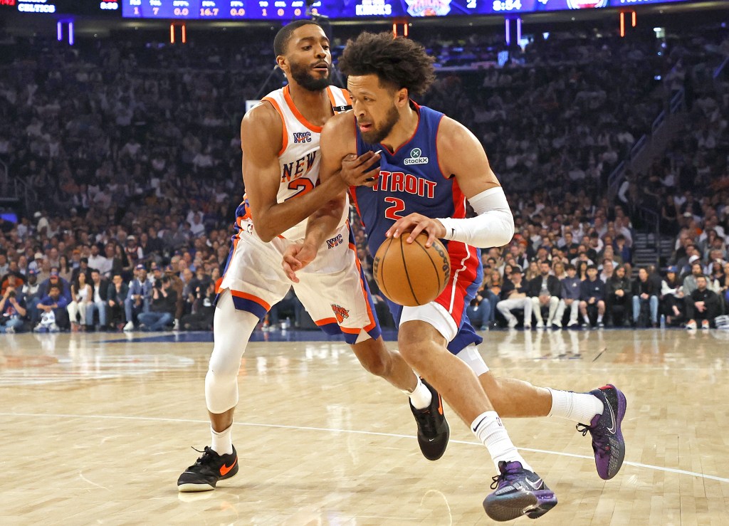Cade Cunningham, who scored a game-high 24 points, drives on Mikal Bridges during the Knicks' 106-103 Game 5 win over the Pistons on April 29, 2025.