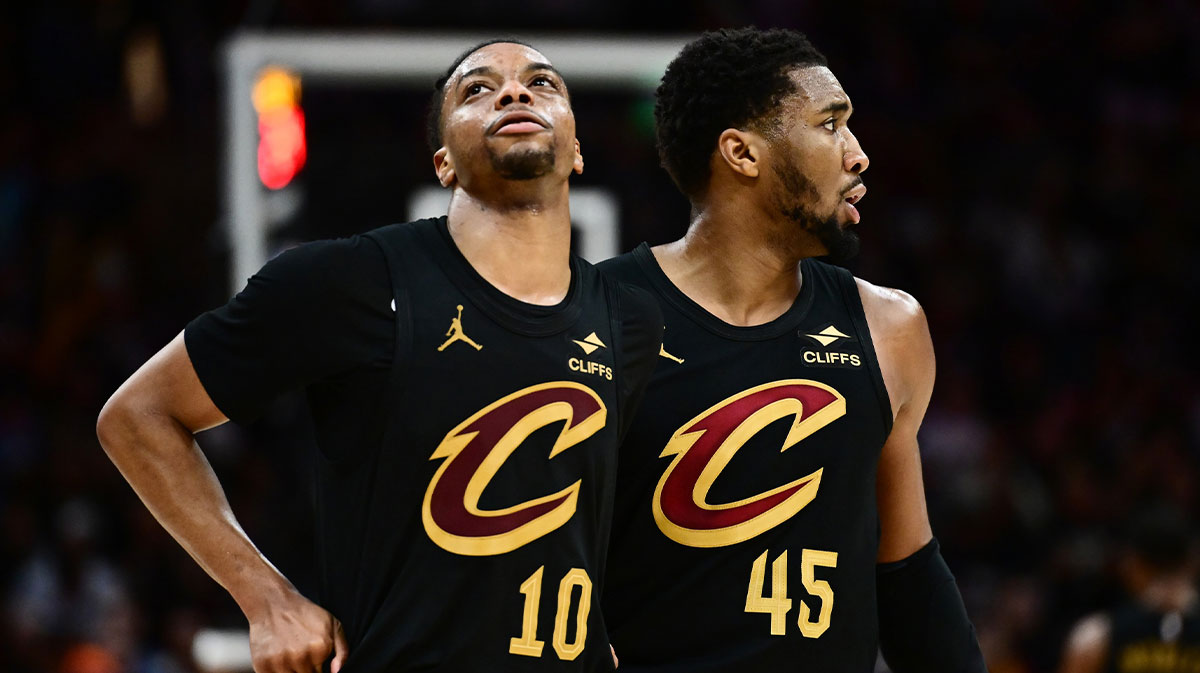 Cavs guard Darius Garland (10) and guard Donovan Mitchell (45) react