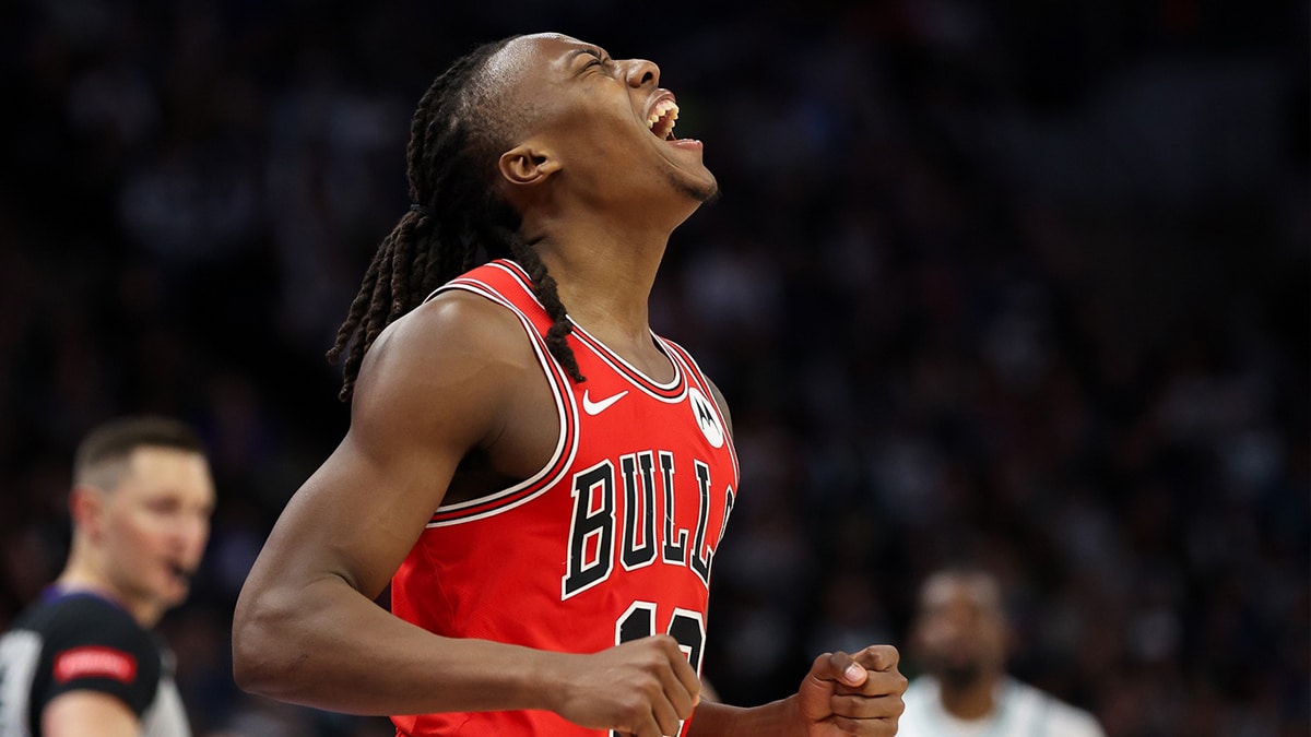 Chicago Bulls guard Ayo Dosunmu (12) celebrates during the second half against the Minnesota Timberwolves at Target Center.