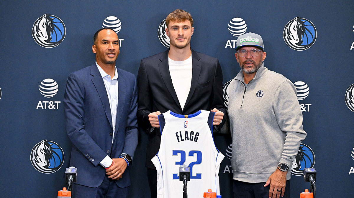 Dallas Mavericks general manager Nico Harrison and Mavericks first overall pick Cooper Flagg and head coach Jason Kidd pose for a photo at the Dallas Mavericks Practice Facility.