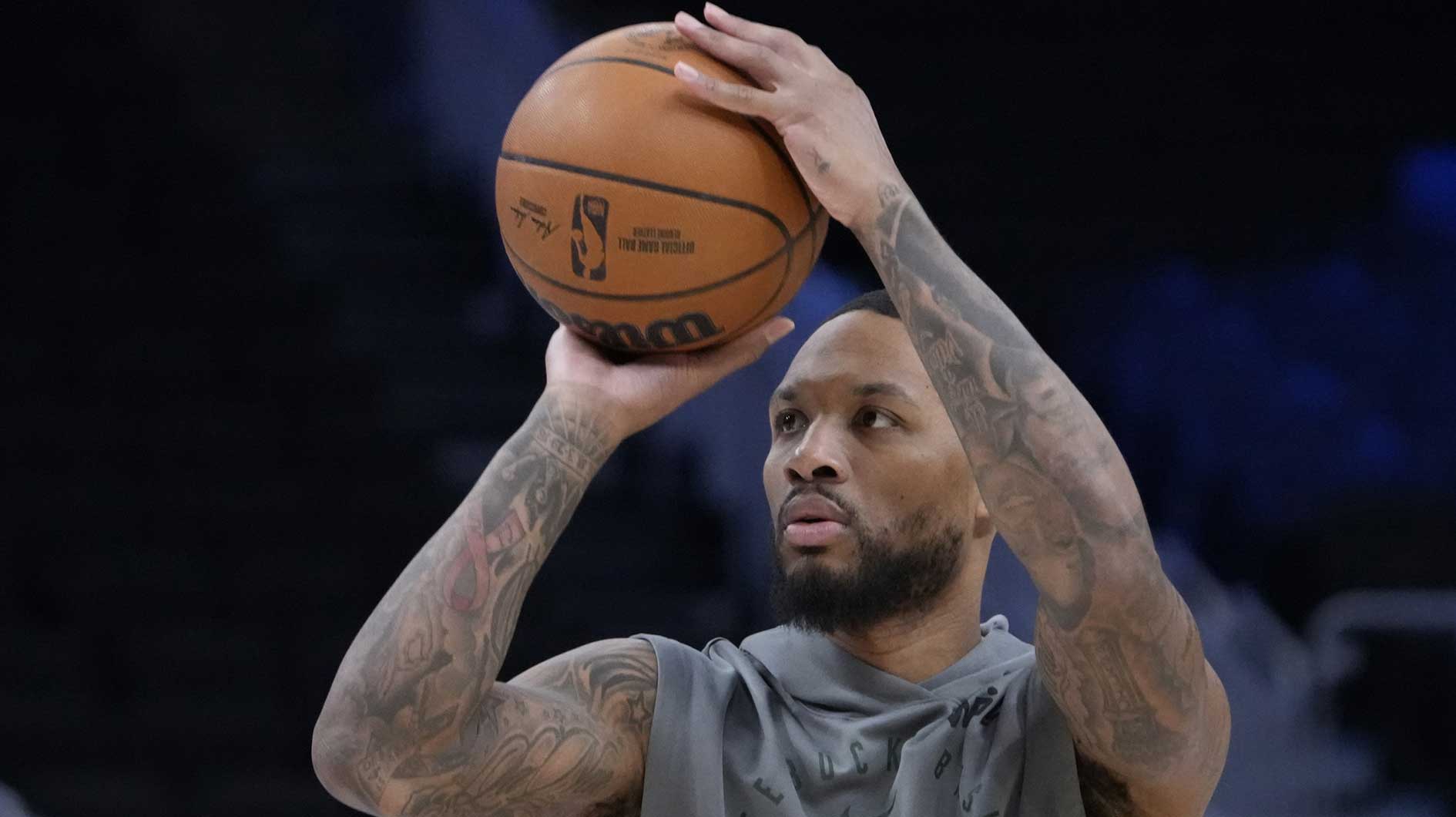 Milwaukee Bucks guard Damian Lillard (0) pus up a shot during warm ups before their game against the Toronto Raptors at Fiserv Forum.