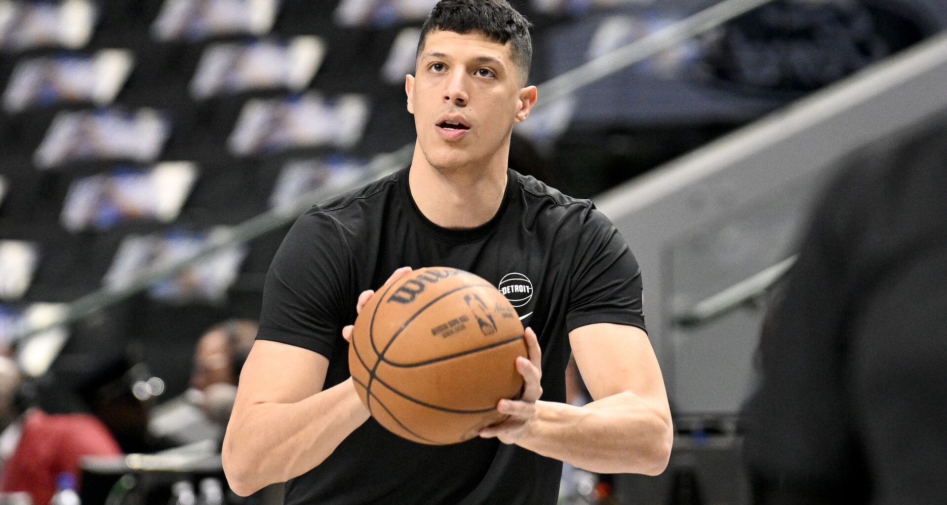 Detroit Pistons forward Simone Fontecchio (19) warms up before the game between the Dallas Mavericks and the Detroit Pistons at the American Airlines Center.