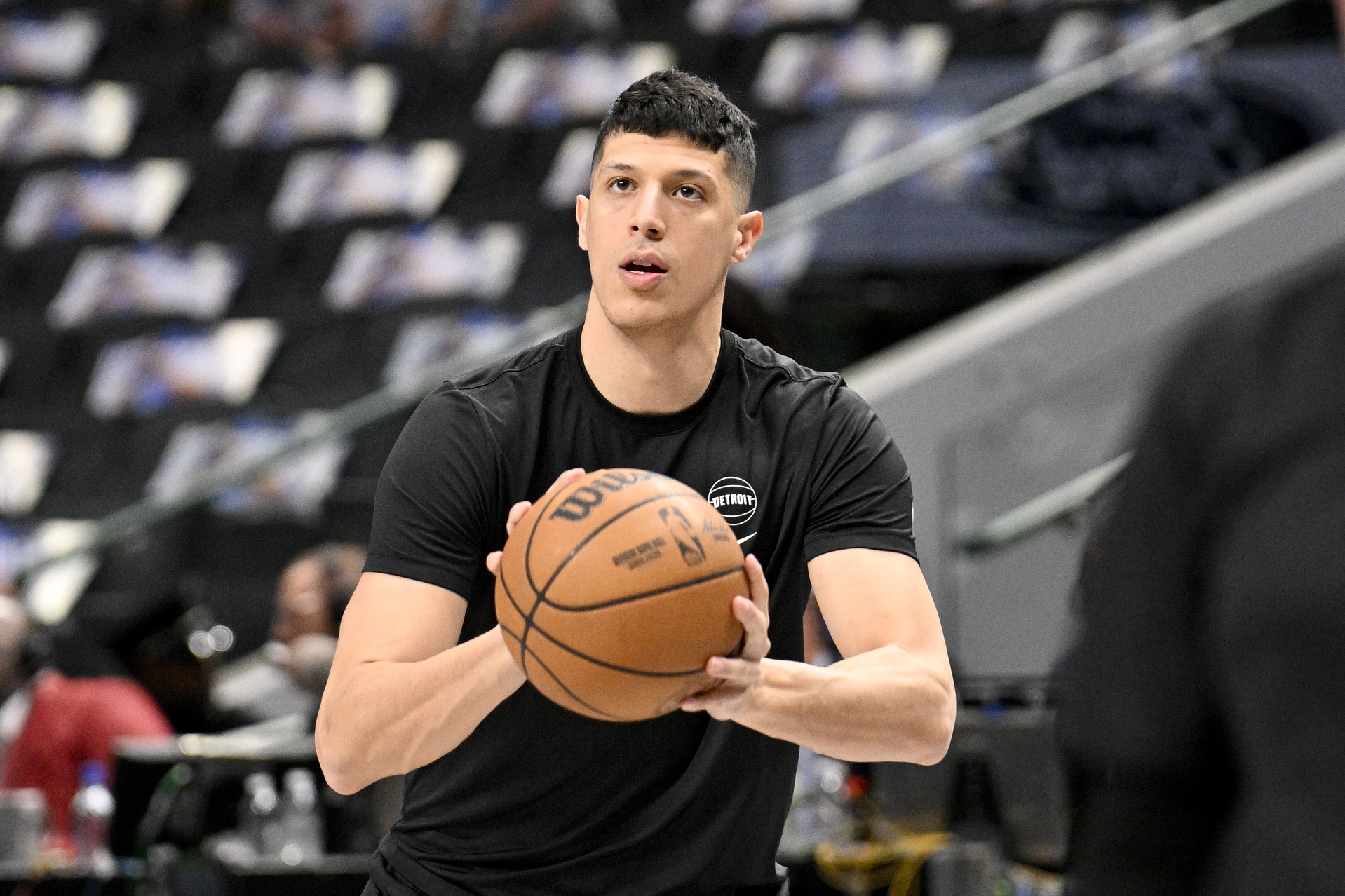 Detroit Pistons forward Simone Fontecchio (19) warms up before the game between the Dallas Mavericks and the Detroit Pistons at the American Airlines Center.