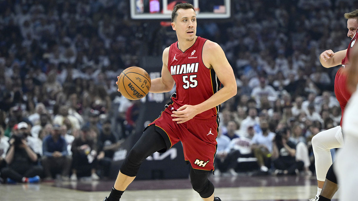 Miami Heat forward Duncan Robinson (55) dribbles the ball in the first quarter against the Cleveland Cavaliers at Rocket Arena.
