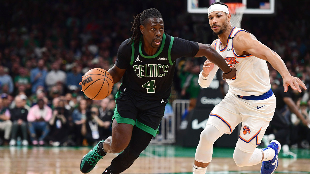 Celtics guard Jrue Holiday (4) controls the ball while New York Knicks guard Josh Hart (3) defends in the second half during game five of the second round for the 2025 NBA Playoffs at TD Garden
