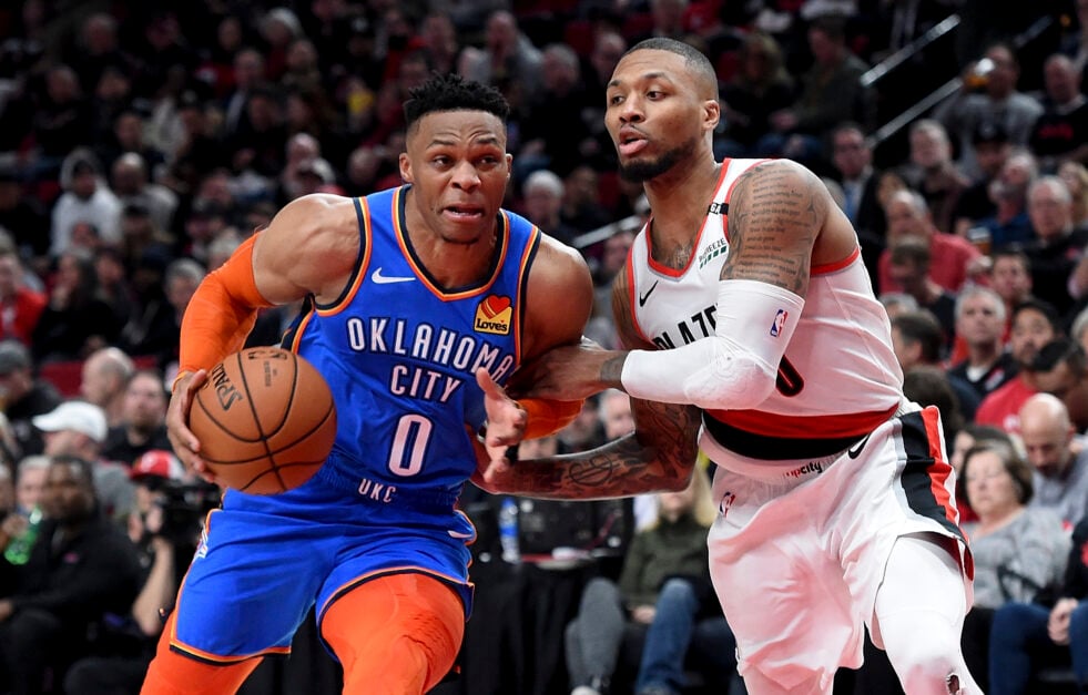 Oklahoma City Thunder guard Russell Westbrook drives against Portland Trail Blazers guard Damian Lillard