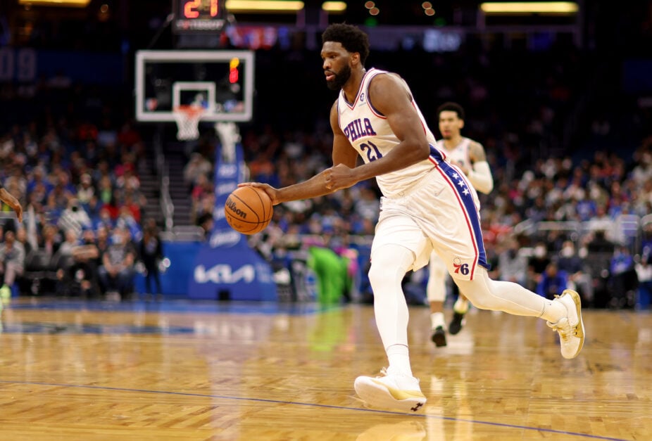 Philadelphia 76ers center Joel Embiid dribbles against the Orlando Magic