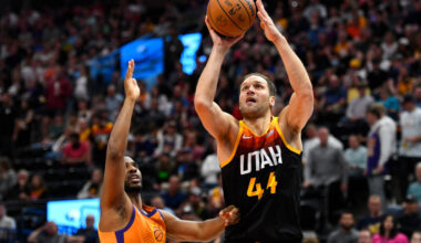Bojan Bogdanovic #44 of the Utah Jazz shoots over Chris Paul #3 of the Phoenix Suns during the seco...