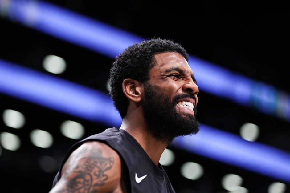 Kyrie Irving #11 of the Brooklyn Nets reacts during the third quarter of the game against the Milwaukee Bucks at Barclays Center.