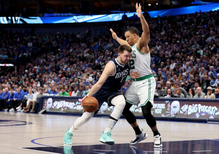 Luka Doncic #77 of the Dallas Mavericks drives to the basket against Grant Williams #12 of the Boston Celtics in the second half at American Airlines Center on January 05, 2023 in Dallas, Texas.