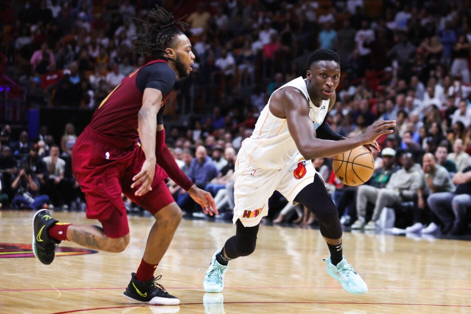 Miami Heat guard Victor Oladipo dribbles past Darius Garland