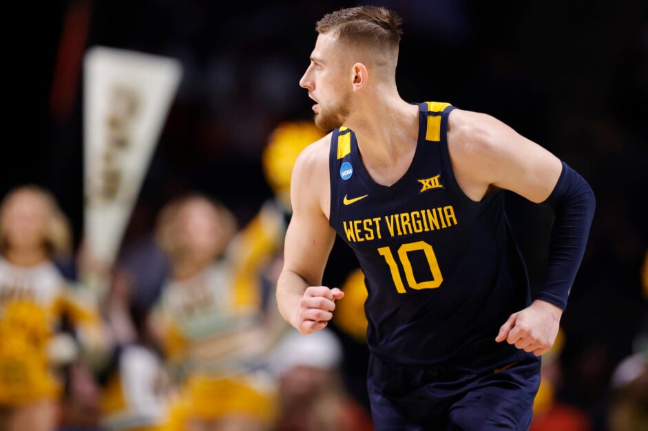 Erik Stevenson #10 of the West Virginia Mountaineers runs down court against the Maryland Terrapins in the second half during the first round of the NCAA Men's Basketball Tournament.