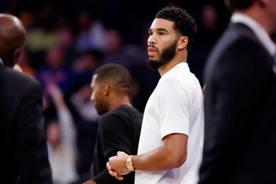Jayson Tatum #0 of the Boston Celtics looks on from the bench during the second half of a preseason game against the New York Knicks at Madison Square Garden.