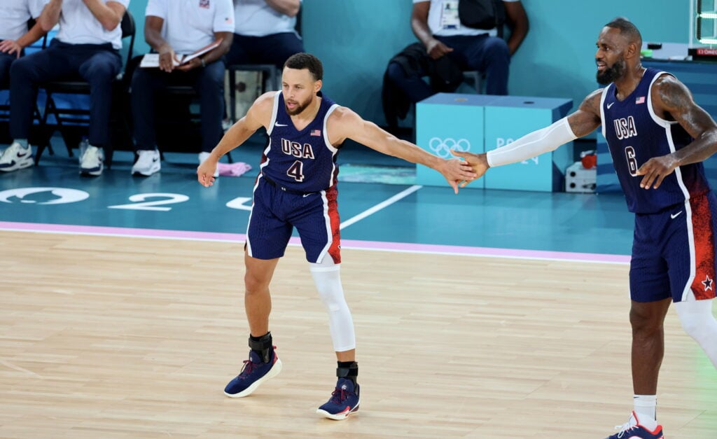 LeBron James and Stephen Curry shake hands while on Team USA at the 2024 Paris Olympics