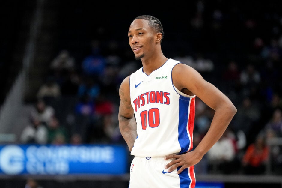Ron Holland II #00 of the Detroit Pistons looks on against the Cleveland Cavaliers during an NBA preseason game at Little Caesars Arena on October 16, 2024 in Detroit, Michigan.