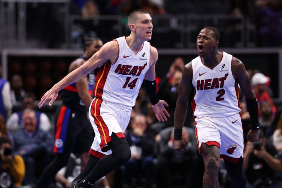 Miami Heat guards Tyler Herro and Terry Rozier celebrate against the Detroit Pistons