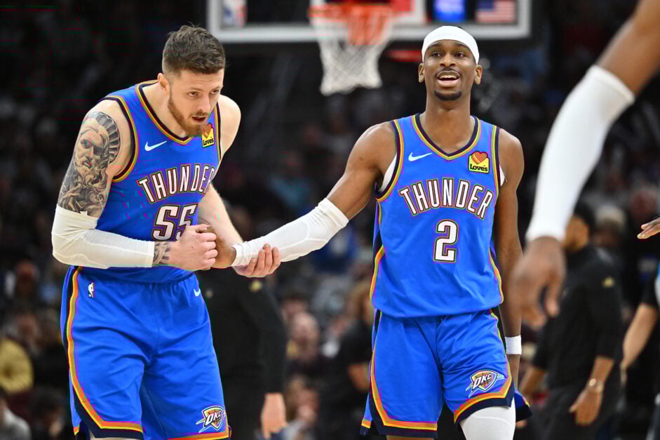 Oklahoma City Thunder guard Shai Gilgeous-Alexander celebrates with Isaiah Hartenstein