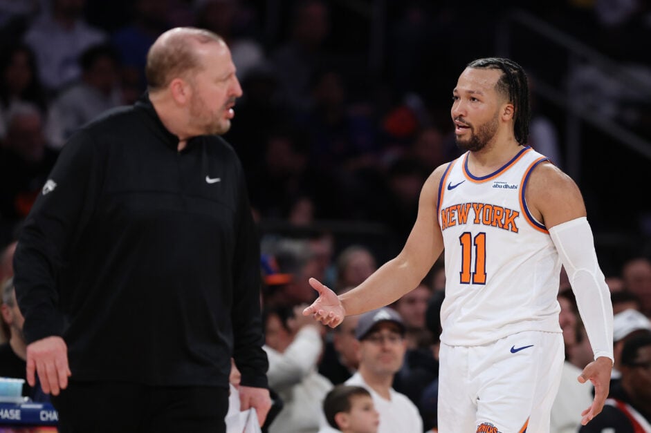 New York Knicks guard Jalen Brunson confers with head coach Tom Thibodeau