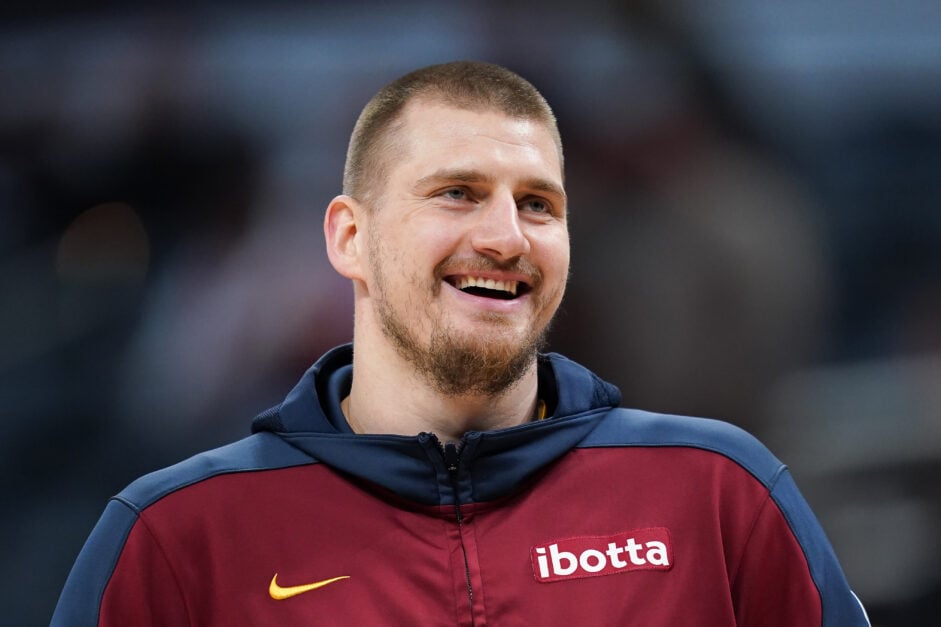 Nikola Jokić #15 of the Denver Nuggets warms up before the game against the Indiana Pacers.