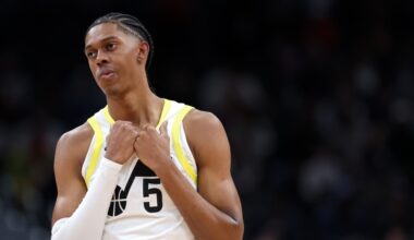 Cody Williams #5 of the Utah Jazz reacts against the Washington Wizards...