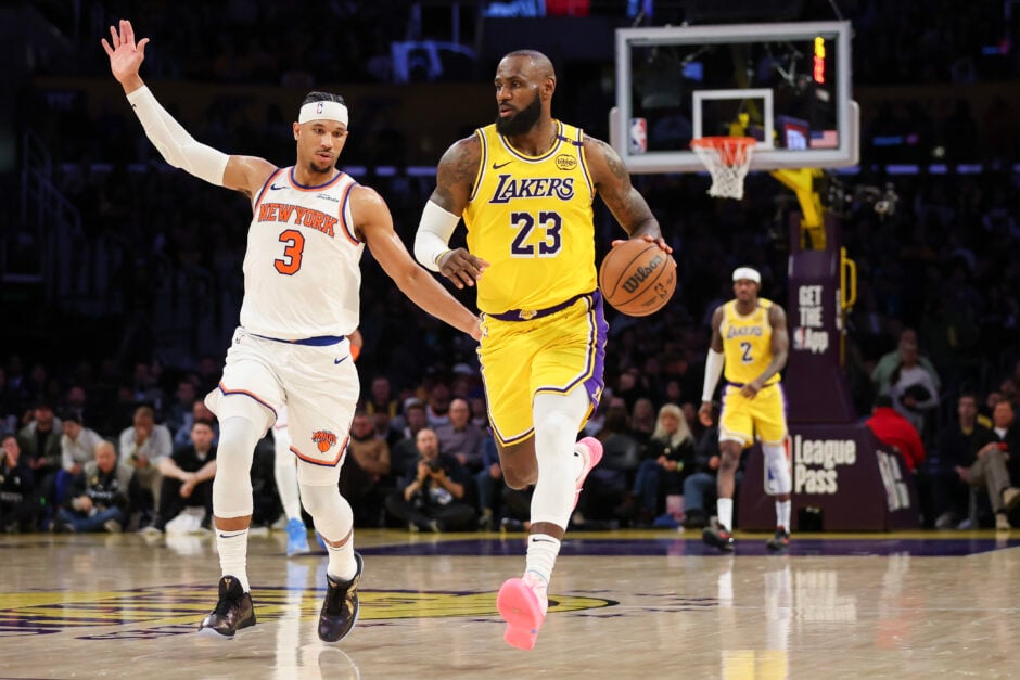 LeBron James of the LA Lakers dribbles against New York Knicks guard Josh Hart