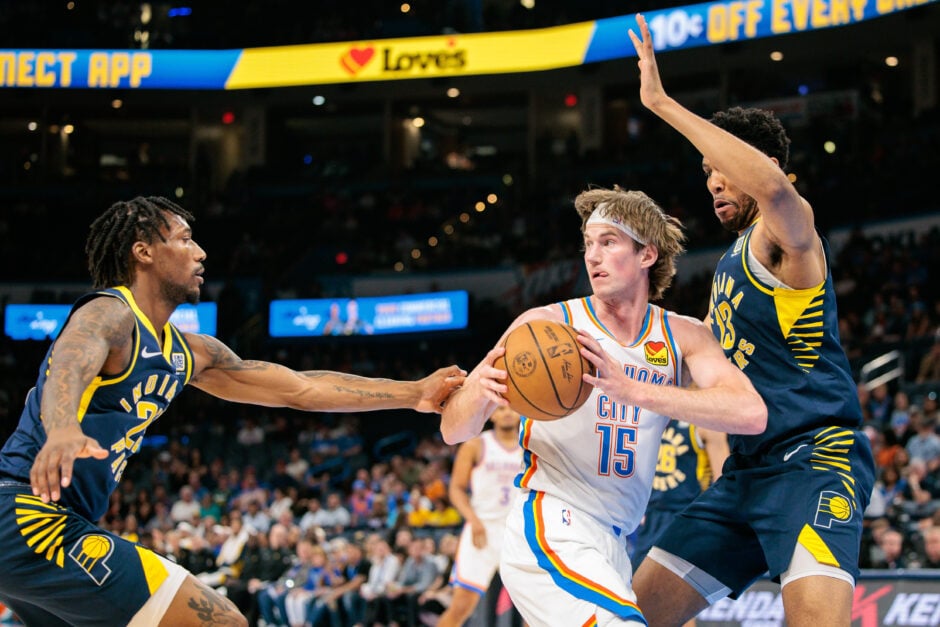 Branden Carlson collides with Tony Bradley
