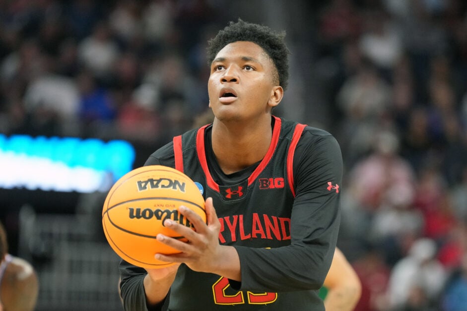 Derik Queen shoots a free-throw for Maryland