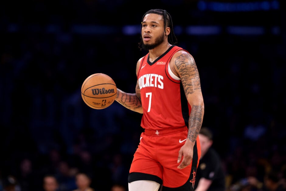 Cam Whitmore playing for the Houston Rockets, which is now his former team due to a trade with the Washington Wizards.