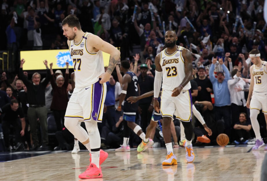 Los Angeles Lakers guard Luka Doncic (77) and Los Angeles Lakers forward LeBron James (23) leave the court after loss to Timberwolves. The LA Lakers and the Minnesota Timberwolves in game three of the NBA playoffs, at the Target Center.