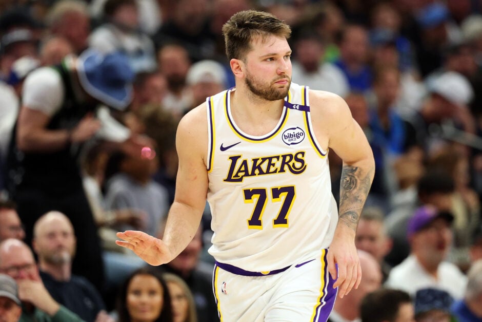 Luka Doncic #77 of the Los Angeles Lakers reacts to his three-point basket against the Minnesota Timberwolves in the second quarter of Game Four of the First Round of the 2025 NBA Playoffs at Target Center.