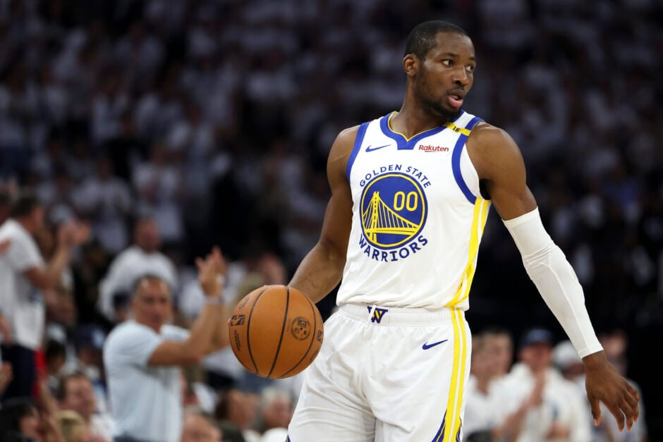 Jonathan Kuminga #00 of the Golden State Warriors handles the ball during the first quarter of Game Five of the Western Conference Second Round NBA Playoffs against the Minnesota Timberwolves.