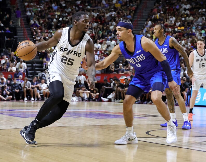 David Jones-Garcia #25 of the San Antonio Spurs drives against Ryan Nembhard #9 of the Dallas Mavericks in the first half of a 2025 NBA Summer League game at the Thomas & Mack Center on July 12, 2025 in Las Vegas, Nevada.