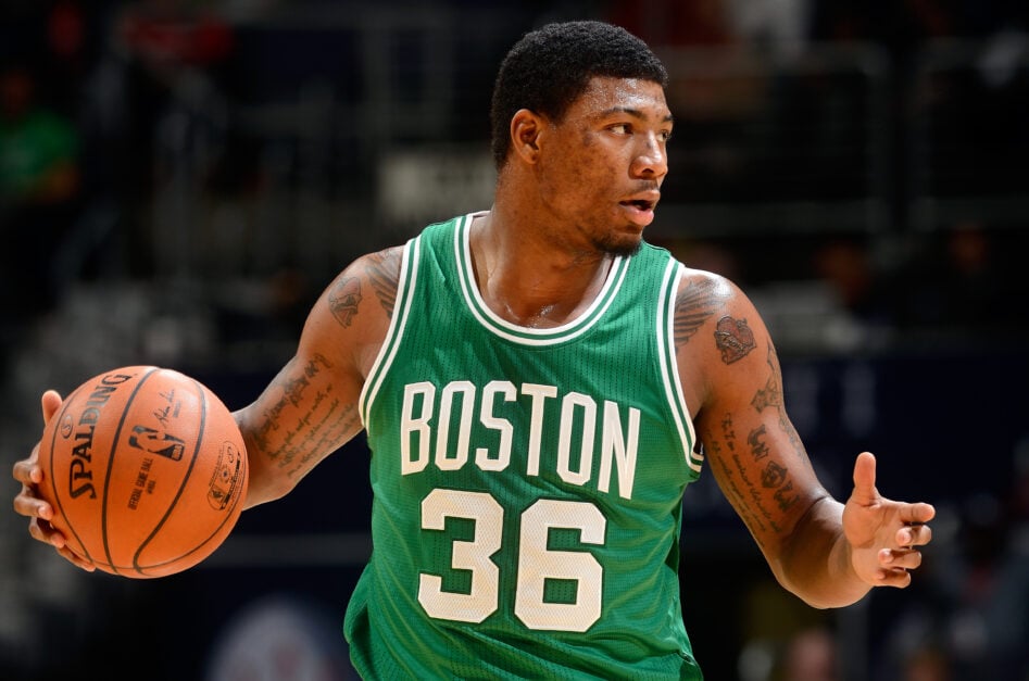 Marcus Smart #36 of the Boston Celtics handles the ball against the Washington Wizards.