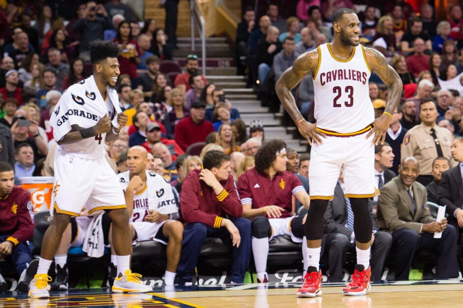 Iman Shumpert #4 of the Cleveland Cavaliers celebrates with LeBron James #23 of the Cleveland Cavaliers during the first half at Quicken Loans Arena on December 20, 2015 in Cleveland, Ohio.