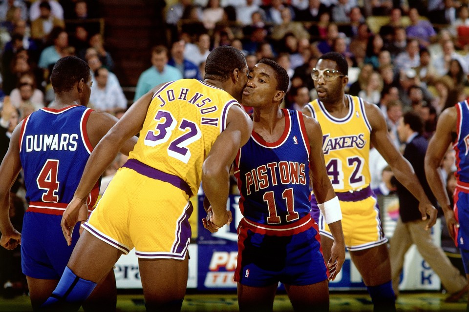LOS ANGELES - 1989: Magic Johnson #32 of the Los Angeles Lakers and Isiah Thomas #11 of the Detroit Pistons shake hands at center court prior to the NBA game at the Forum in Los Angeles, California.  NOTE TO USER: User expressly acknowledges and agrees that, by downloading and or using this photograph, User is consenting to the terms and conditions of the Getty Images License Agreement. Mandatory Copyright Notice: Copyright 1989 NBAE  (Photo by Andrew D. Bernstein/NBAE via Getty Images)