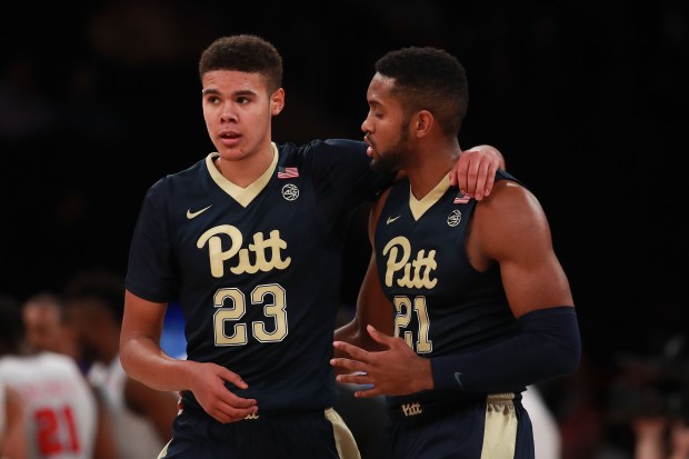 Cameron Johnson (23) and Sheldon Jeter (21) of the Pittsburgh Panthers talk against the Southern Methodist Mustangs in the first half during the 2K Classic at Madison Square Garden on November 17, 2016 in New York City. (Photo by Michael Reaves/Getty Images)
