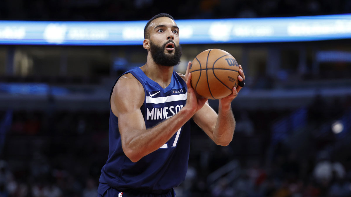 Minnesota Timberwolves center Rudy Gobert (27) shoots a free throw against the Chicago Bulls during the first half at United Center.